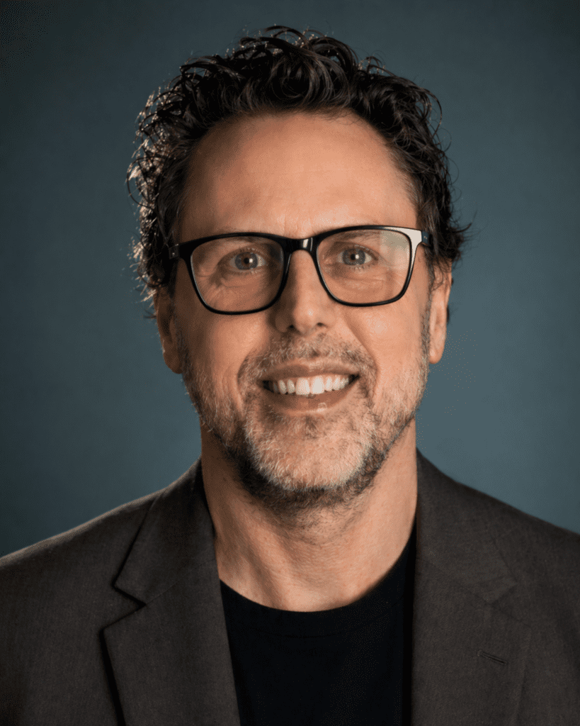 Headshot of Tommy Landry, Founder of Return On Now and strategic consultant focused on internal AI governance and external AI visibility (AEO / GEO / SEO).